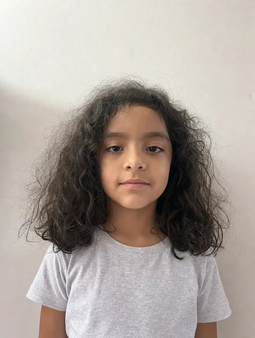 Cabello rizado antes de usar el kit